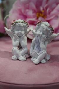 Bílé růžově oděné sedící sošky andělů 2-set