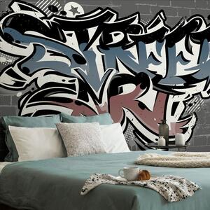 Tapeta s cihlovou imitací a nápisem Street Art
