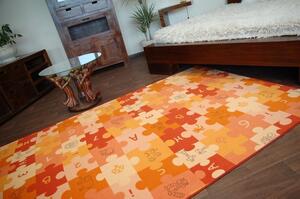 Dywany Lusczow Dětský koberec PUZZLE oranžový