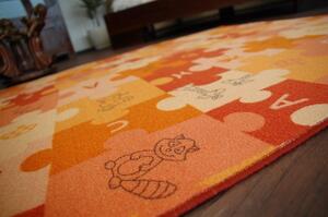 Dywany Lusczow Dětský koberec PUZZLE oranžový