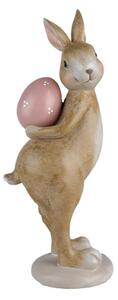 Velikonoční figurka hnědý zajíček schovává růžové vajíčko za zády Vrollenberg – 10x12x31 cm
