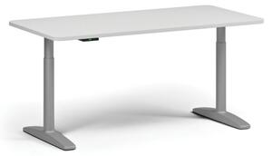 Výškově nastavitelný stůl OBOL, elektrický, 675-1325 mm, zaoblené rohy, deska 1600x800 mm, šedá zaoblená podnož, bílá
