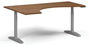 Výškově nastavitelný stůl OBOL, elektrický, 675-1325 mm, ergonomický levý, deska 1800x1200 mm, šedá zaoblená podnož, ořech