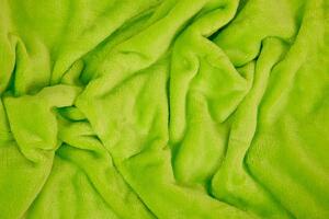 Deka z kolekce SLEEP WEEL. Přijemná deka z mikroflanelu v limetkové barvě. Rozměr deky je 150x200 cm