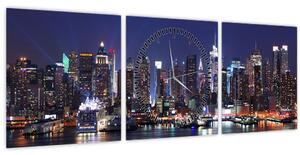 Obraz - Osvětlené New Yorské mrakodrapy (s hodinami) (90x30 cm)