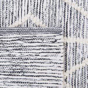 Krátkovlasý koberec krémově šedý 140 x 200 cm EDREMIT