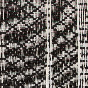 Kožený koberec 80 x 150 cm černý s béžovým FEHIMLI
