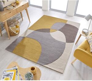Okrově žlutý vlněný koberec 170x120 cm Glow - Flair Rugs