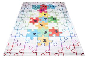Makro Abra Dětský kusový koberec vhodný k praní BAMBINO 2673 Puzzle Číslice pogumovaný krémový barevný Rozměr: 120x170 cm