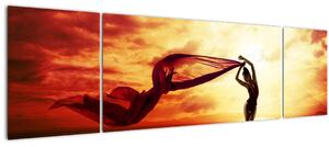 Obraz - Silueta ženy v západu slunce (170x50 cm)