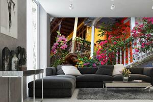 DIMEX | Vliesová fototapeta Balkon s květinami MS-5-0789 | 375 x 250 cm| zelená, vicebarevna, růžová