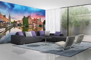 DIMEX | Vliesová fototapeta Bruges, Belgie MS-5-1014 | 375 x 250 cm| zelená, modrá, oranžová, hnědá, šedá