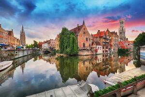 DIMEX | Vliesová fototapeta Bruges, Belgie MS-5-1014 | 375 x 250 cm| zelená, modrá, oranžová, hnědá, šedá
