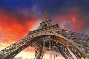 DIMEX | Vliesová fototapeta Eiffelova věž MS-5-1035 | 375 x 250 cm| modrá, oranžová, hnědá