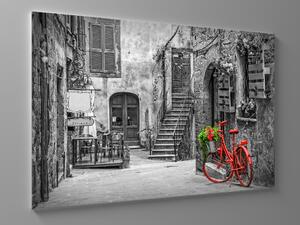 Liox Obraz červené kolo v uličce Rozměr: 60 x 40 cm