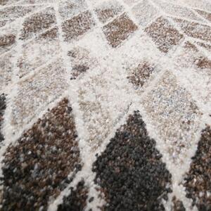Hnědý vzorovaný koberec a abstraktním motivem Šířka: 60 cm | Délka: 100 cm