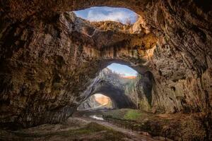 DIMEX | Vliesová fototapeta Nádherný pohled z jeskyně MS-5-1662 | 375 x 250 cm| oranžová, hnědá, šedá