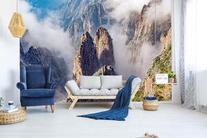 DIMEX | Vliesová fototapeta Mlhavé vrcholky hor MS-5-1691 | 375 x 250 cm| modrá, hnědá, šedá