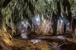 DIMEX | Vliesová fototapeta Osvětlená jeskyně MS-5-1758 | 375 x 250 cm| krémová, hnědá, šedá