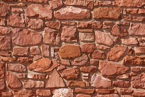 DIMEX | Vliesová fototapeta Terakotová kamenná zeď MS-5-2379 | 375 x 250 cm| červená
