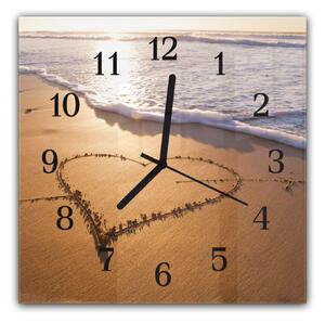 Nástěnné hodiny 30x30cm srdce v písku na pláží - plexi