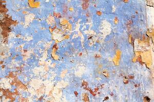 DIMEX | Vliesová fototapeta Stará popraskaná omítka MS-5-2421 | 375 x 250 cm | modrá, bílá, oranžová