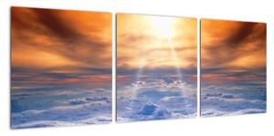 Moderní obraz - slunce nad mraky (90x30cm)