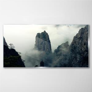 Obraz na skle Obraz na skle Mountain fog mlhou strom mraky
