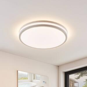 Lindby Arnim LED stropní svítidlo, bílé, plast, Ø 49 cm, IP44, stmívatelný, Bílá / opál, Koupelna, Plast, Moderní