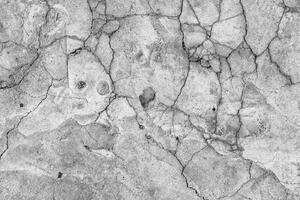 DIMEX | Vliesová fototapeta Prasklá betonová textura MS-5-2646 | 375 x 250 cm | černá, šedá