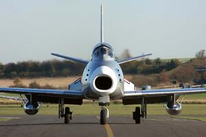 DIMEX | Vliesová fototapeta Rychlé bojové letadlo MS-5-2849 | 375 x 250 cm | zelená, modrá, šedá