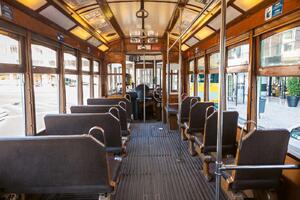 DIMEX | Vliesová fototapeta Interiér staré tramvaje MS-5-2883 | 375 x 250 cm | žlutá, hnědá, šedá