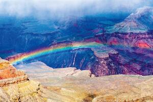 DIMEX | Vliesová fototapeta Duha nad Grand Canyonem MS-5-3022 | 375 x 250 cm | modrá, červená, fialová, žlutá, hnědá