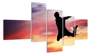 Obraz skákajícího muže (150x85cm)