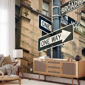 Fototapeta New York Broadway - sloup s dopravními značkami na pozadí architektury
