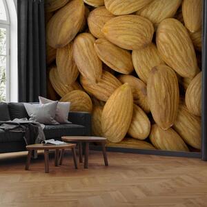 Fototapeta Ořechová chuť - monolit z mandlí v béžových odstínech do kuchyně