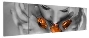 Obraz - oranžové kameny v dlani (170x50cm)