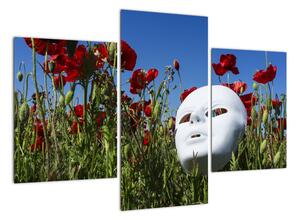Obraz - maska v trávě (90x60cm)