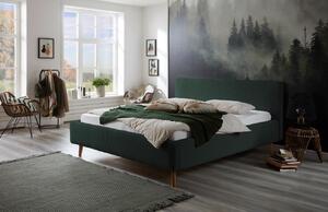 Tmavě zelená manšestrová dvoulůžková postel Meise Möbel Mattis 180 x 200 cm s úložným prostorem