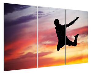 Obraz skákajícího muže (120x80cm)