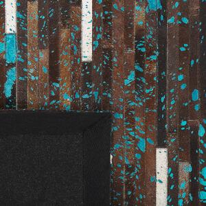 Kožený koberec 140 x 200 cm hnědo-modrý KISIR