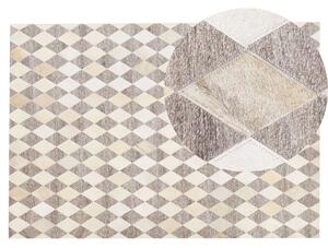 Kožený koberec béžovo-hnědý 140 x 200 cm SESLICE