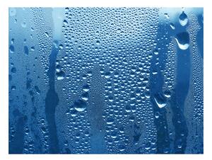Fototapeta - Vodní kapky na modrém skle 200x154