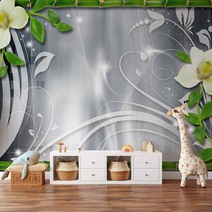 Fototapeta Rostlinná kompozice s bambusy - orchideje s ornamenty na šedém pozadí