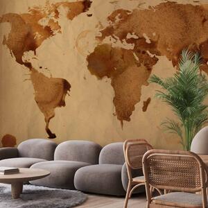 Fototapeta Svět kávy - abstraktní mapa světa ve formě skvrn na pískovém pozadí