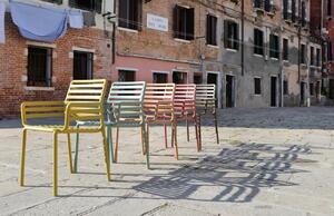 Žlutozelená plastová zahradní židle Nardi Doga s područkami