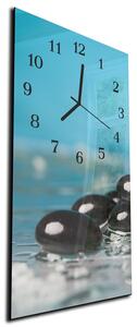 Nástěnné hodiny 30x60cm černé oblázky ve vodě - plexi