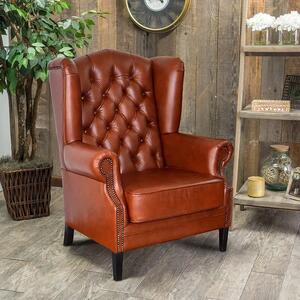 Chesterfield Harold Kožené křeslo na dřevěných nohách puncované