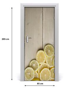 Fototapeta na dveře samolepící citrony na dřevě 85x205 cm
