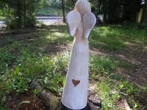 Anděl srdce bílá patina 62cm-svítící na jednu čajovou svíčku, do zahrady nebo i exteriéru.Ale pod střechu